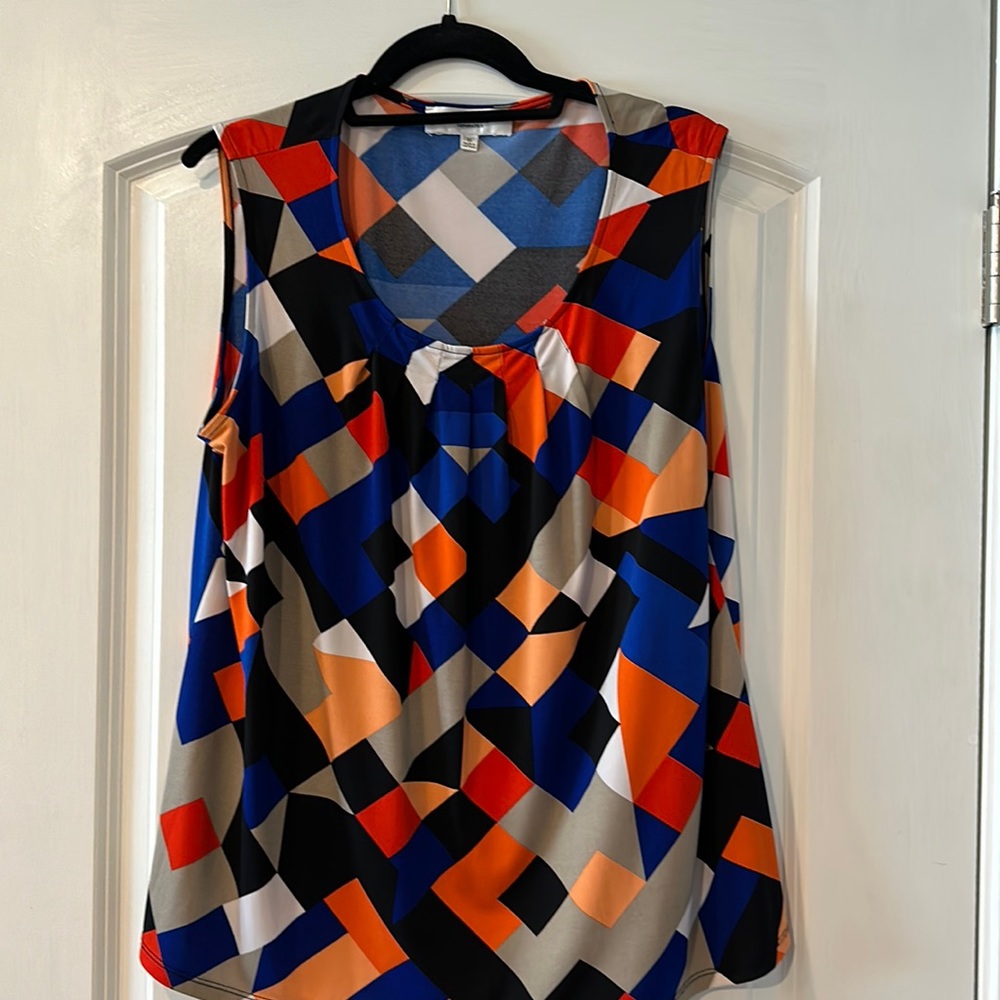 Women’s blouse. Sleeveless, scooped neck. Multi color - orange blue black tan
